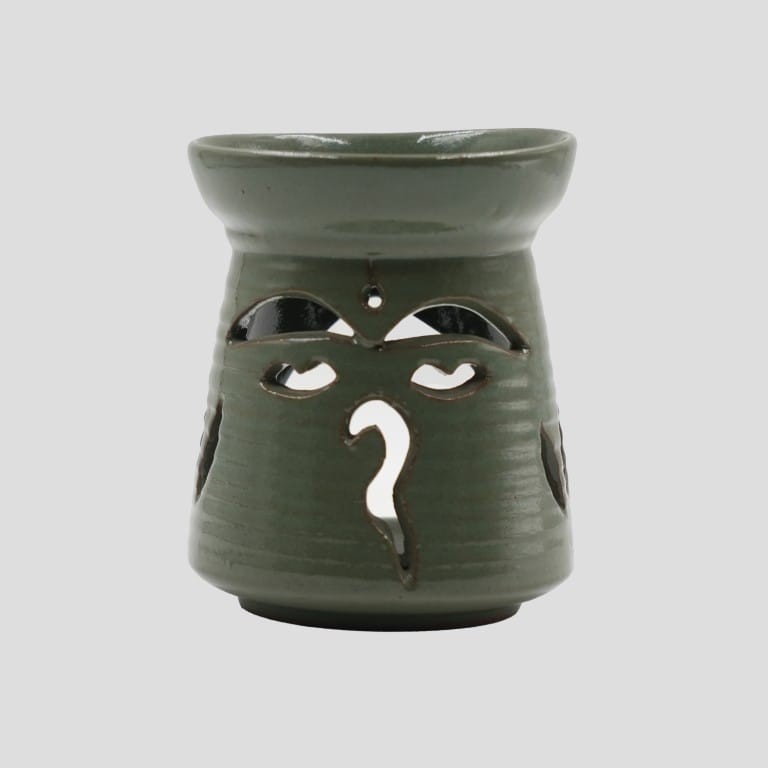 Green Ceramic Tealight Holder with Swaymbhunath Design Cutout - image 1